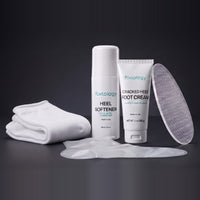 Footology Heel Reset Kit: Heel Softener roll-on, Cracked Heel Foot Cream, glass foot file, overnight foot wrap, and cotton socks