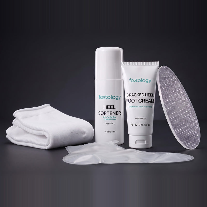 Footology Heel Reset Kit: Heel Softener roll-on, Cracked Heel Foot Cream, glass foot file, overnight foot wrap, and cotton socks