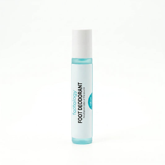footology Foot Deodorant Roll-On bottle on white background. Slim 15 ml glass bottle with aqua liquid