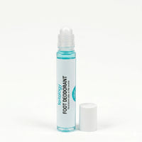 footology Foot Deodorant Roll-On with cap removed showing the rollerball applicator. Slim glass bottle and white screw cap on white background