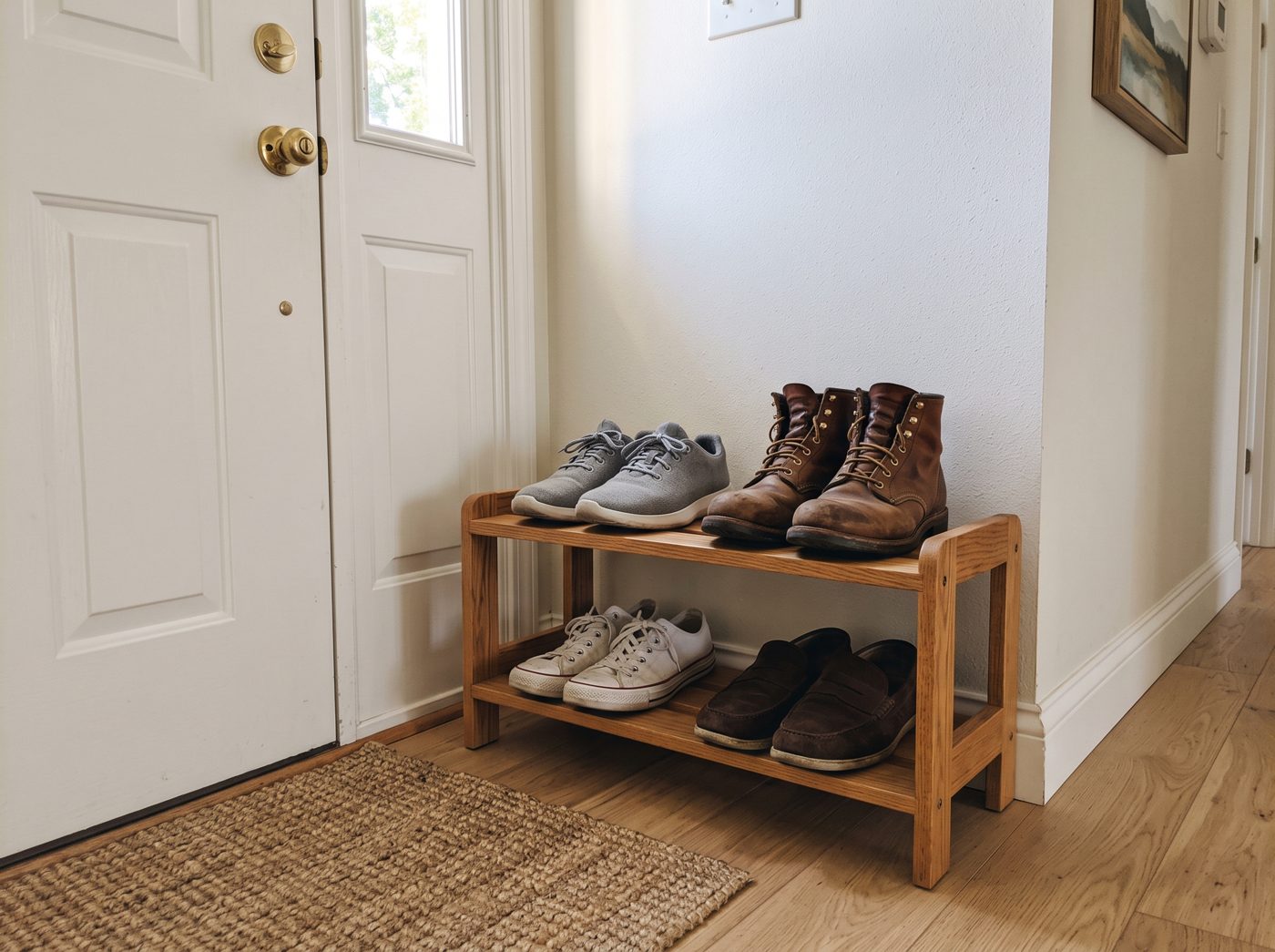 A row of everyday shoes by the front door